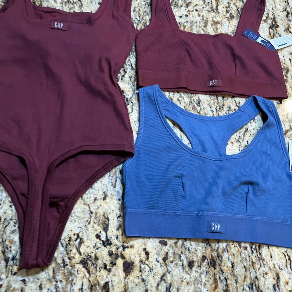 You are getting 3 items 2 cotton rib bralette 1-burgundy 1-blue and 1-body suit
